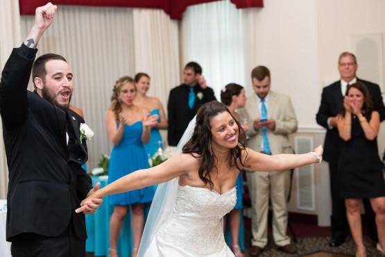 The bride and groom dancing